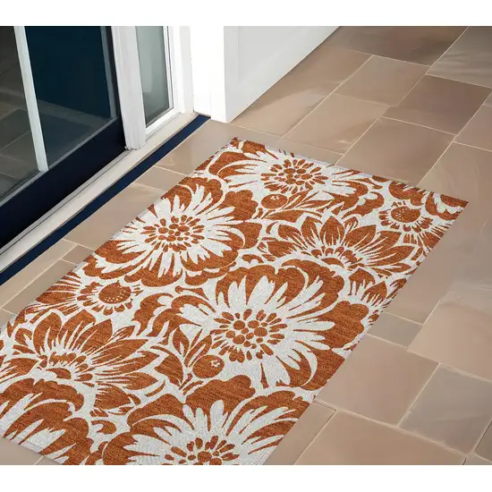 Rust and Ivory Floral Washable Non Skid Indoor Outdoor Area Rug Photo 1