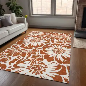 Photo of 3' X 5' Rust and Ivory Floral Washable Non Skid Indoor Outdoor Area Rug