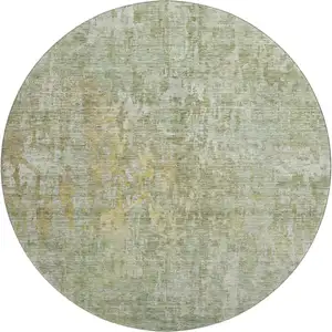 Photo of 8' X 8' Sage Gold And Beige Abstract Washable Round Rug With UV Protection