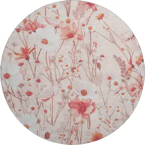 Photo of 8' X 8' Salmon And Ivory Floral Washable Round Rug With UV Protection