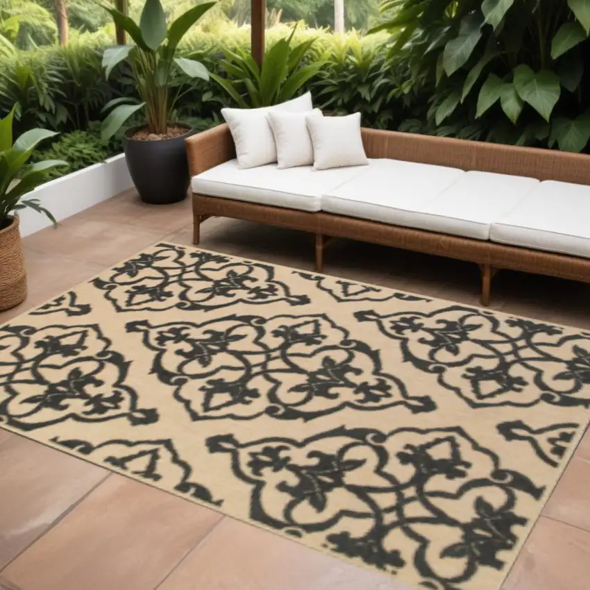 Beige and Black Oriental Stain Resistant Indoor Outdoor Area Rug Photo 1
