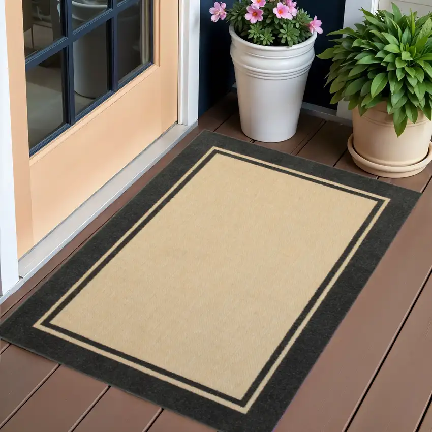 Beige and Black Stain Resistant Indoor Outdoor Area Rug Photo 1