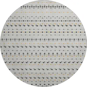 Photo of 8' X 8' Silver Gray And Gold Striped Washable Round Rug With UV Protection