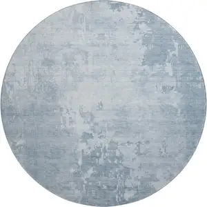Photo of 8' X 8' Sky Blue And Ivory Abstract Washable Round Rug With UV Protection