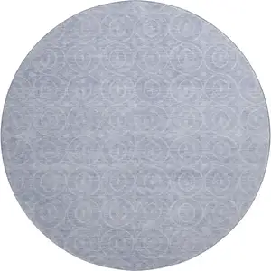 Photo of 8' X 8' Sky Blue And Ivory Geometric Washable Round Rug With UV Protection