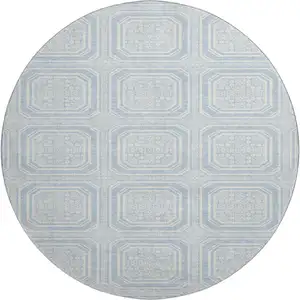 Photo of 8' X 8' Sky Blue And Ivory Geometric Washable Round Rug With UV Protection