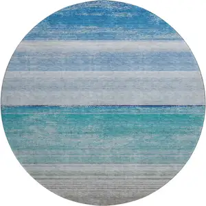 Photo of 8' X 8' Sky Blue Beige And Ivory Striped Washable Round Rug With UV Protection