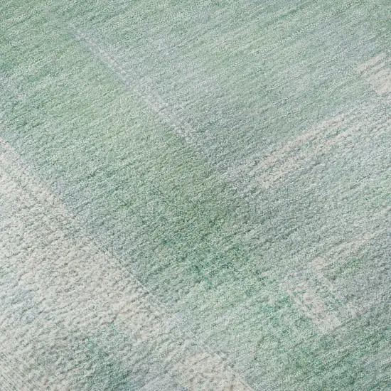 8' X 8' Sky Blue Ivory And Teal Abstract Washable Round Rug With UV Protection Photo 8