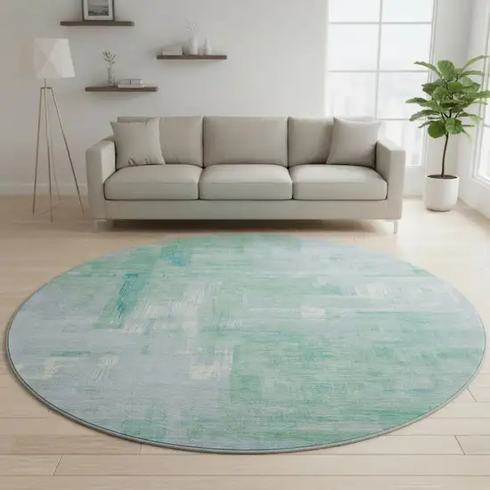 8' X 8' Sky Blue Ivory And Teal Abstract Washable Round Rug With UV Protection Photo 2