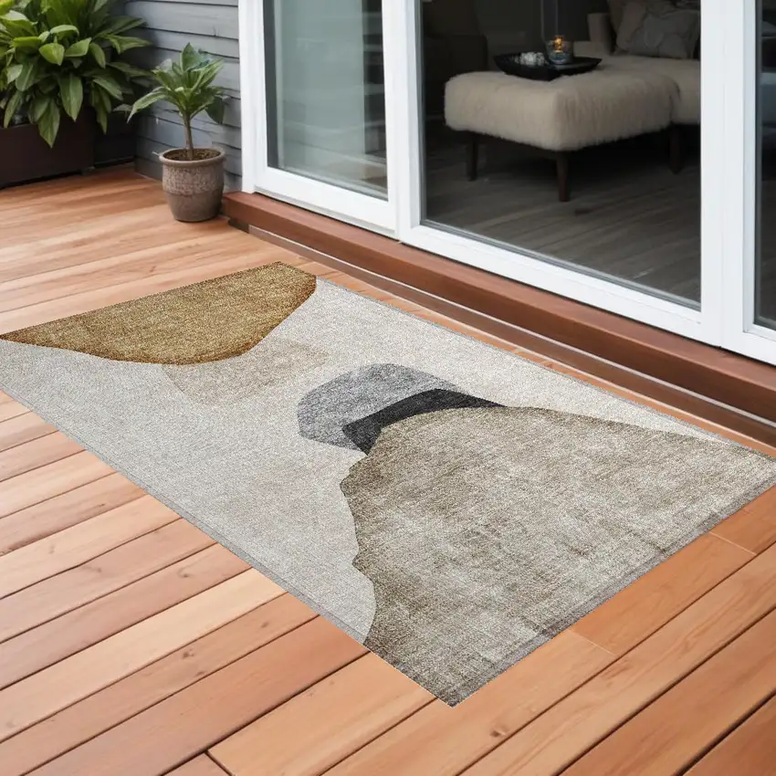 3' X 4' Tan Brown and Gray Abstract Washable Non Skid Indoor Outdoor Area Rug Photo 1