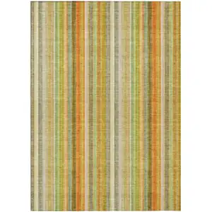 Photo of 3' X 5' Tan Orange and Green Striped Washable Non Skid Indoor Outdoor Area Rug