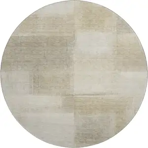 Photo of 8' X 8' Taupe And Ivory Geometric Washable Round Rug With UV Protection