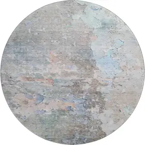 Photo of 8' X 8' Taupe Blue And Gray Abstract Washable Round Rug With UV Protection