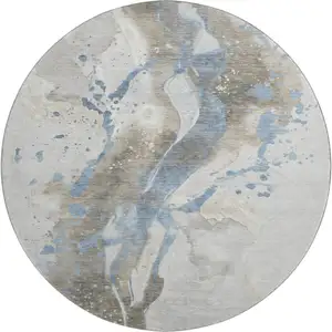 Photo of 8' X 8' Taupe Blue And Ivory Abstract Washable Round Rug With UV Protection