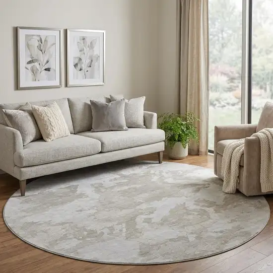 8' X 8' Taupe Gray And Silver Abstract Washable Round Rug With UV Protection Photo 1