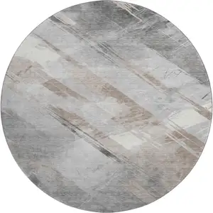 Photo of 8' X 8' Taupe Gray And Silver Striped Washable Round Rug With UV Protection