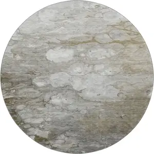 Photo of 8' X 8' Taupe Ivory And Gray Abstract Washable Round Rug With UV Protection