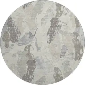 Photo of 8' X 8' Taupe Ivory And Gray Abstract Washable Round Rug With UV Protection