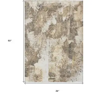 Photo of 3' X 5' Taupe and Ivory Floral Washable Non Skid Indoor Outdoor Area Rug