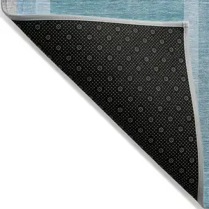 Photo of 3' X 5' Teal Abstract Washable Non Skid Indoor Outdoor Area Rug