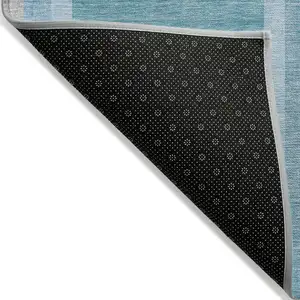 Photo of 3' X 5' Teal Abstract Washable Non Skid Indoor Outdoor Area Rug