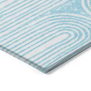 Photo of 3' X 4' Teal Abstract Washable Non Skid Indoor Outdoor Area Rug