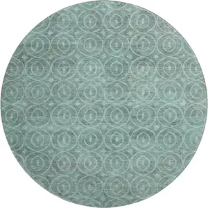Photo of 8' X 8' Teal And Aqua Geometric Washable Round Rug With UV Protection