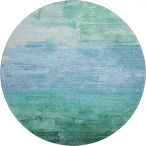 Photo of 8' X 8' Teal And Aqua Striped Washable Round Rug With UV Protection