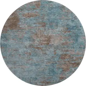 Photo of 8' X 8' Teal And Brown Abstract Washable Round Rug With UV Protection