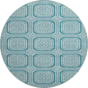 Photo of 8' X 8' Teal And Ivory Geometric Washable Round Rug With UV Protection