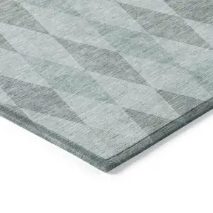 Photo of 3' X 5' Teal Geometric Washable Non Skid Indoor Outdoor Area Rug