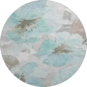 Photo of 8' X 8' Teal Ivory And Beige Floral Washable Round Rug With UV Protection