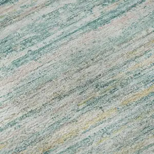 Photo of 8' X 8' Teal Ivory And Gold Striped Washable Round Rug With UV Protection