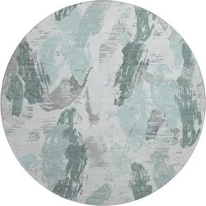 Photo of 8' X 8' Teal Ivory And Gray Abstract Washable Round Rug With UV Protection