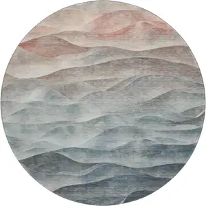 Photo of 8' X 8' Teal Ivory And Salmon Abstract Washable Round Rug With UV Protection