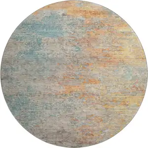 Photo of 8' X 8' Teal Peach And Gold Abstract Washable Round Rug With UV Protection