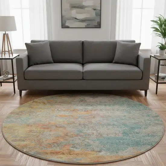 8' X 8' Teal Peach And Gold Abstract Washable Round Rug With UV Protection Photo 2