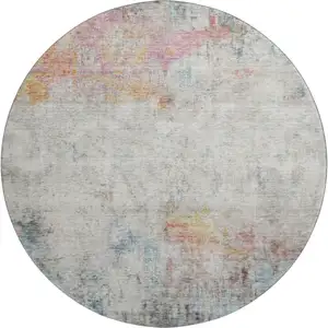 Photo of 8' X 8' Teal Pink And Gold Abstract Washable Round Rug With UV Protection