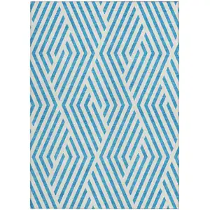 Photo of 3' X 4' Teal and White Geometric Washable Non Skid Indoor Outdoor Area Rug