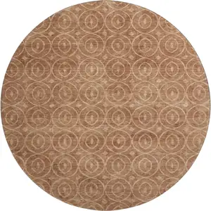 Photo of 8' X 8' Terra Cotta And Rust Geometric Washable Round Rug With UV Protection