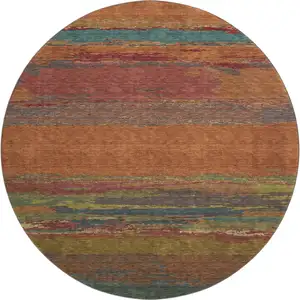 Photo of 8' X 8' Terra Cotta Teal And Green Abstract Washable Round Rug With UV Protection