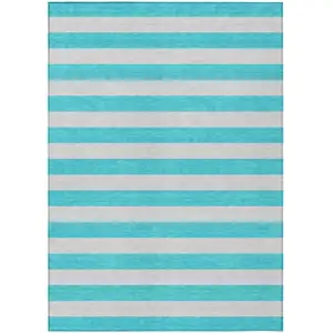Photo of 3' X 5' Turquoise Striped Washable Non Skid Indoor Outdoor Area Rug