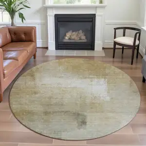 Photo of 8' X 8' Wheat Ivory And Beige Striped Washable Round Rug With UV Protection