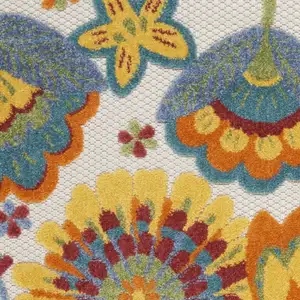 Photo of 2' X 6' Yellow And Teal Floral Non Skid Indoor Outdoor Runner Rug