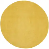 Photo of 4' X 4' Yellow Round Non Skid Indoor Outdoor Area Rug
