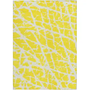 Photo of 3' X 4' Yellow and White Abstract Washable Non Skid Indoor Outdoor Area Rug