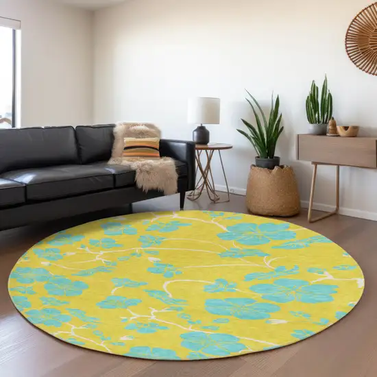 8' Yellow And Aqua Floral Washable Round Rug With UV Protection Photo 4