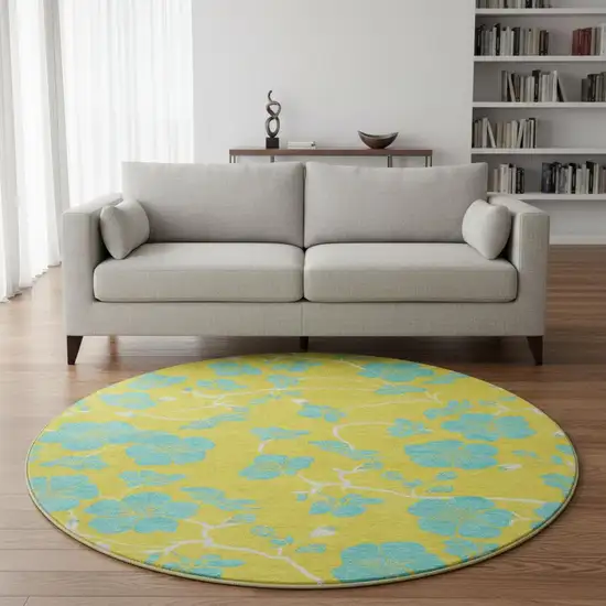 8' Yellow And Aqua Floral Washable Round Rug With UV Protection Photo 2