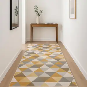 Photo of 12' Yellow And Beige Abstract Runner Rug