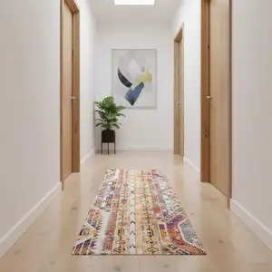 Photo of 11' Yellow And Beige Abstract Runner Rug